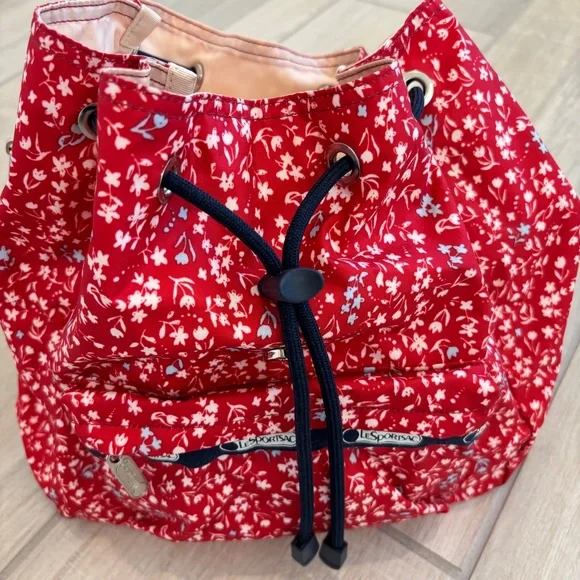 LeSportsac Small Edie Backpack in red  with a white and blue floral pattern. - Picture 7 of 12